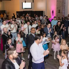 Dads and daughter dancing in the ballroom